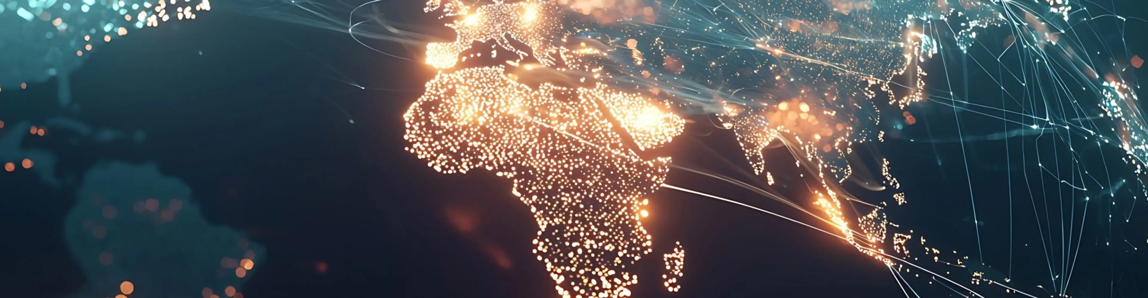 A globe with a map of Africa and Australia lit up in the dark