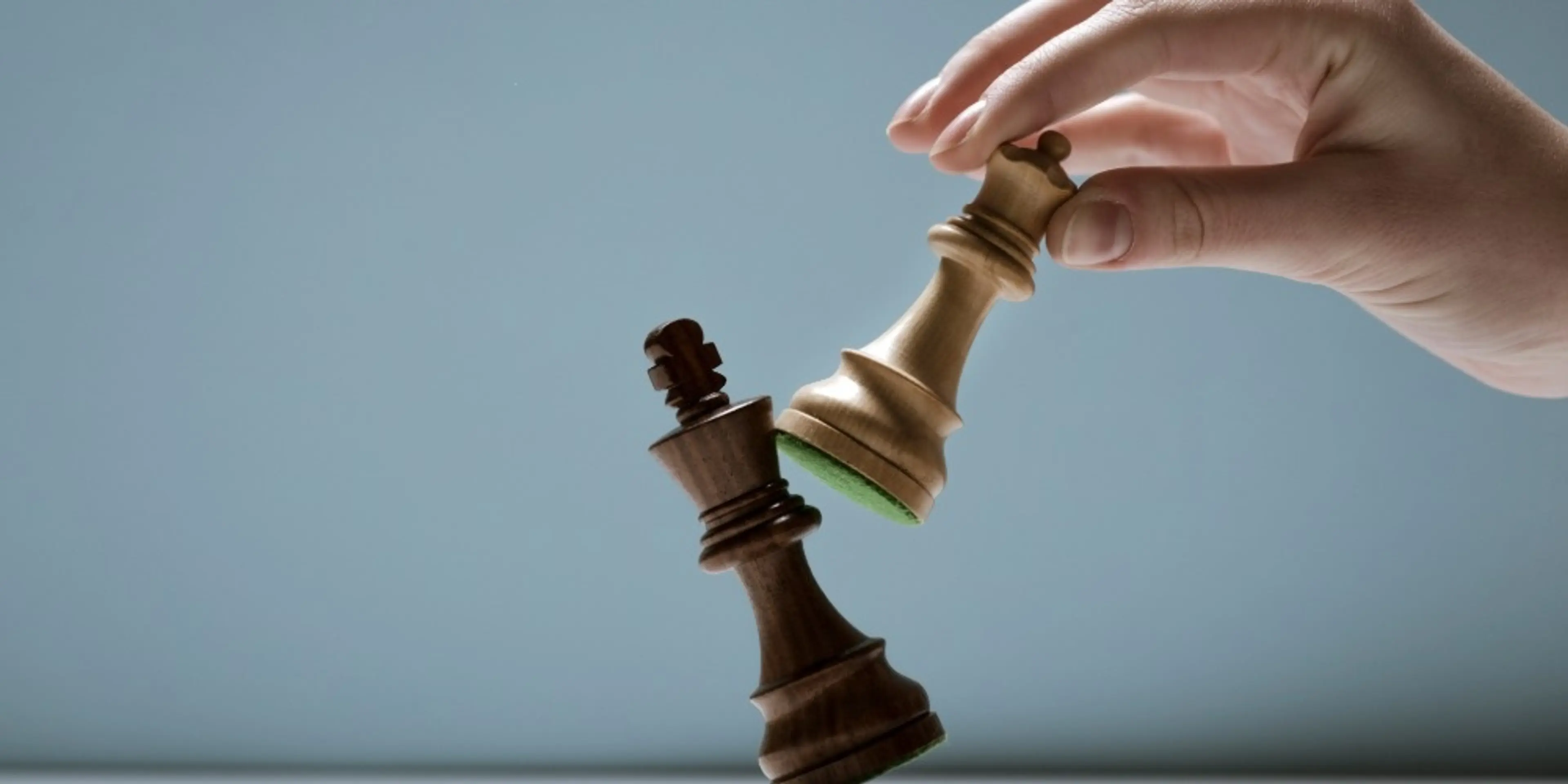 Player defeating his opponent and winning at chess