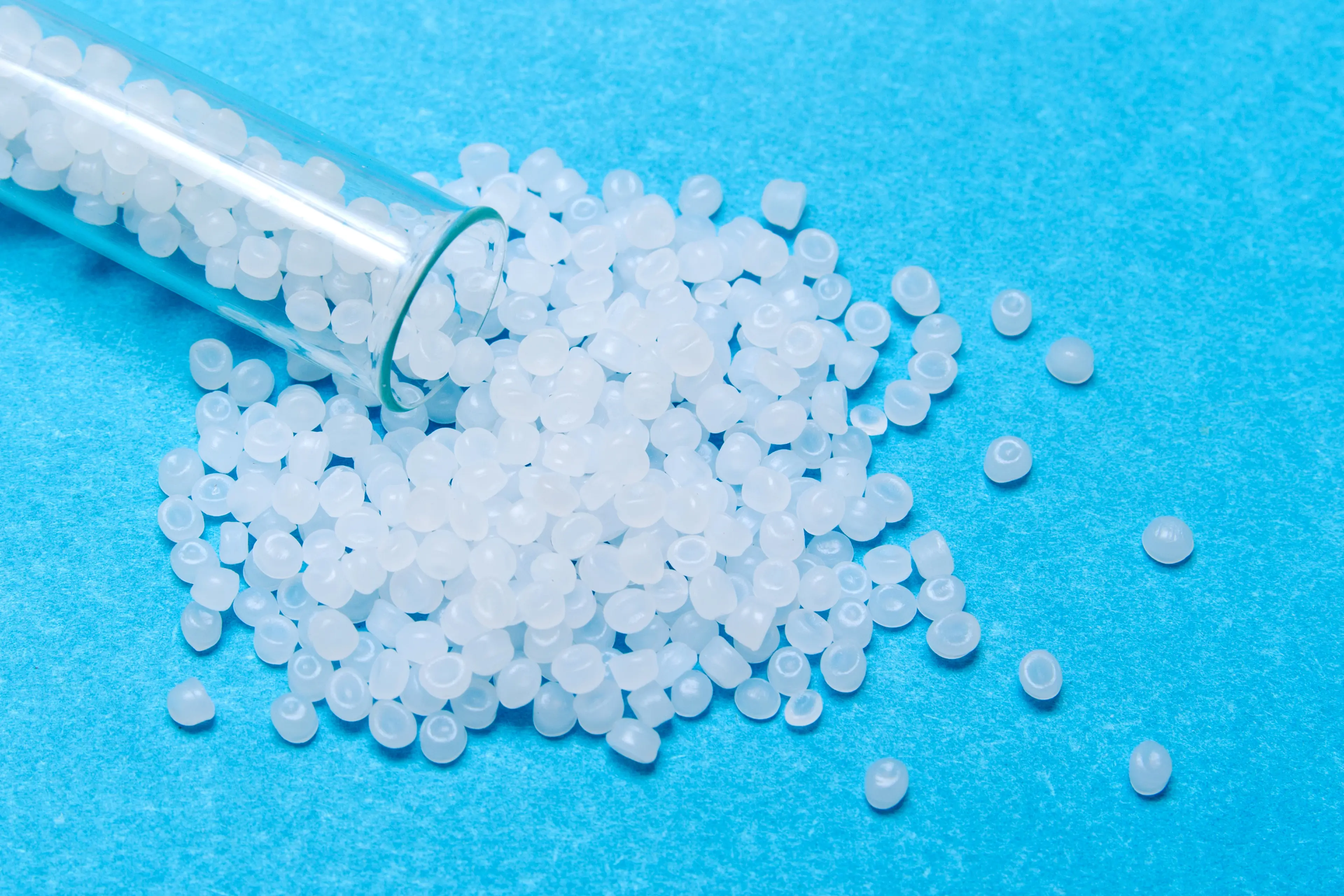 White_pellets_blue_background_5184x3456_shutterstock_1135482695.jpg